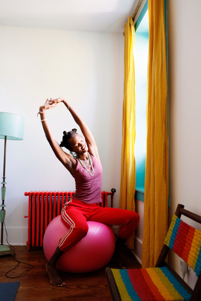 woman stretching exercise ball 865x1298
