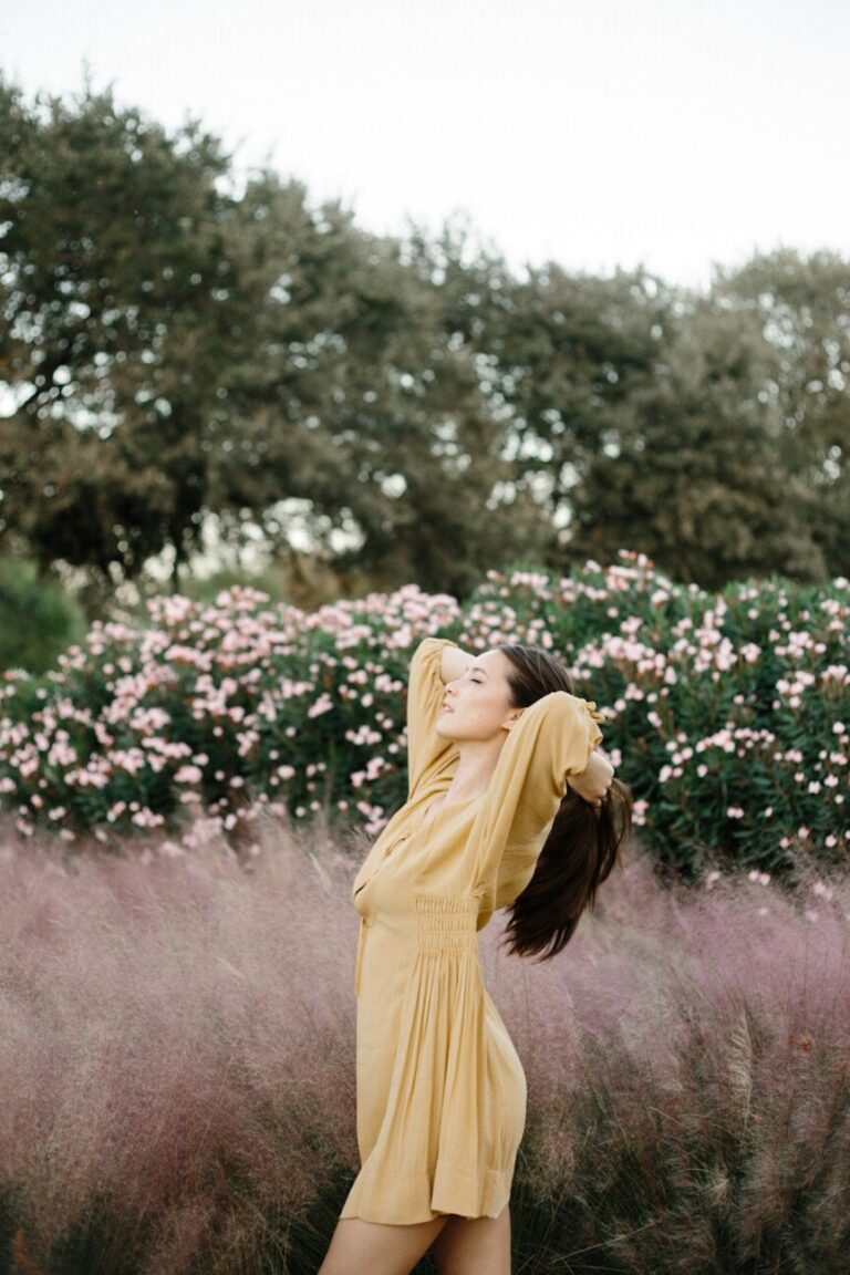 woman wearing yellow dress outside 865x1298